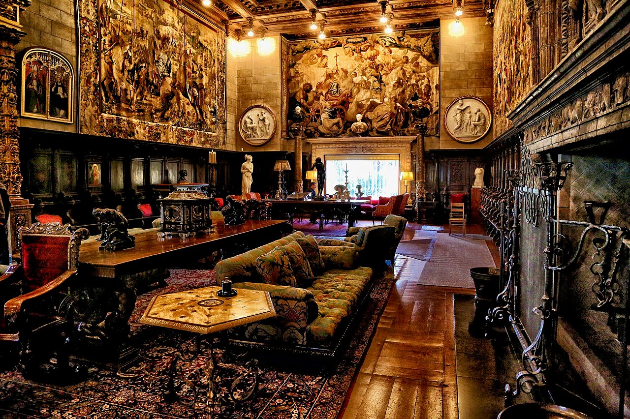 A centuries-old tapestry of a triumphant procession hanging above the fireplace in the Great Assembly Hall at Hearst Castle